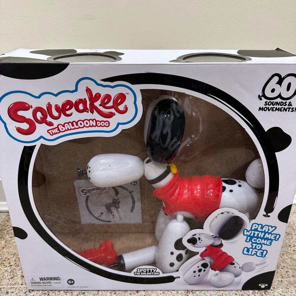 Squeakee the dalmation ballon dog with pictured accessories, instructions, box.